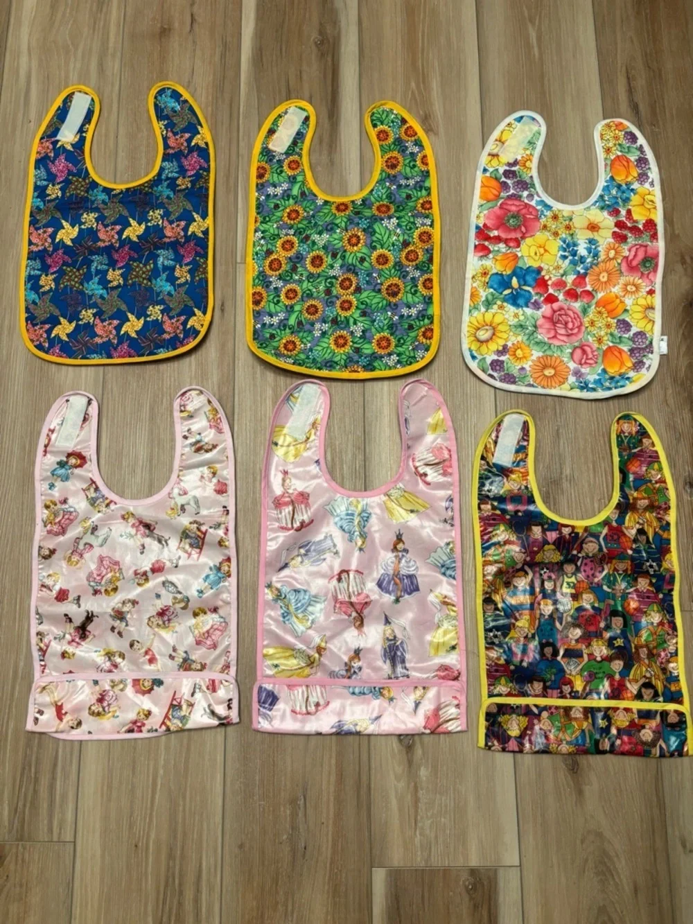 Girls Floral & Princess Patterned Waterproof Bibs set of 6